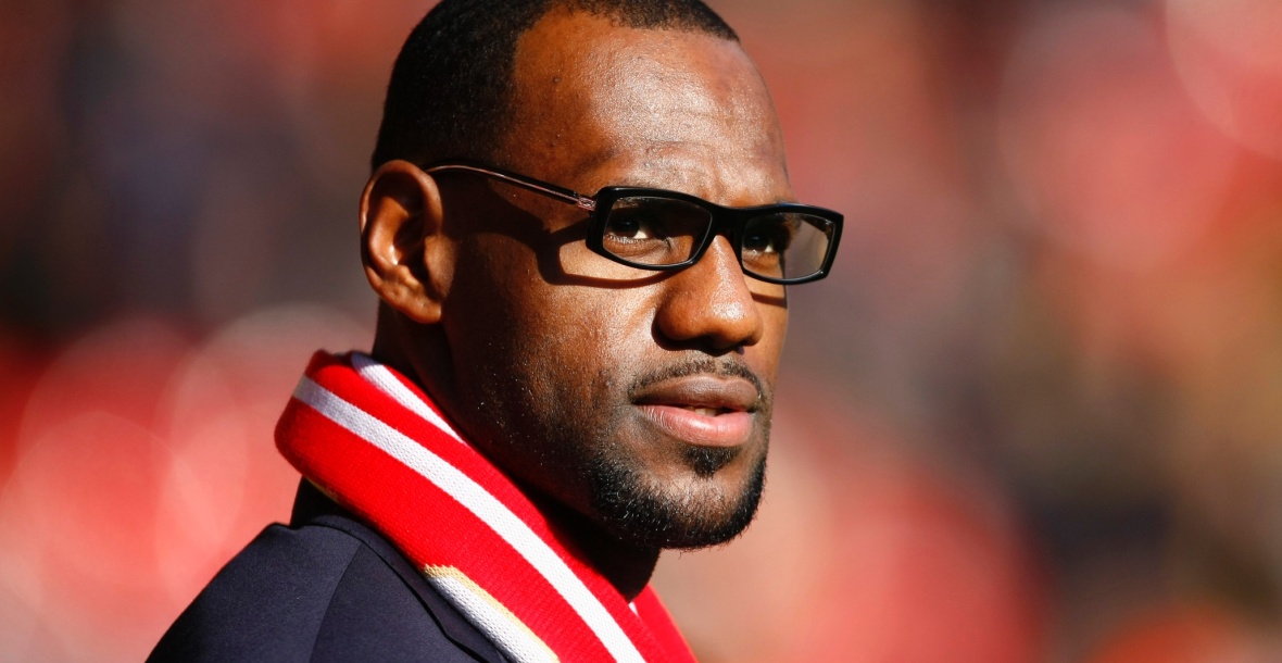 US and Miami Heat basketball player LeBron James looks on before the English Premier League soccer match between Liverpool and Manchester United at Anfield, Liverpool, England, Saturday Oct. 15, 2011. (AP Photo/Tim Hales)